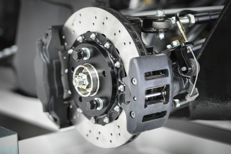 Photo of auto brakes and disc system and calipers.