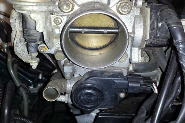 Photo of automotive throttle body.